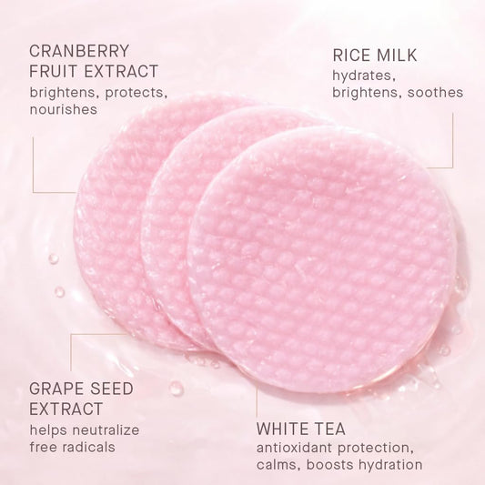 ARCONA Cranberry Triad Milky Toner Pads applied to the face for gentle cleansing and glow