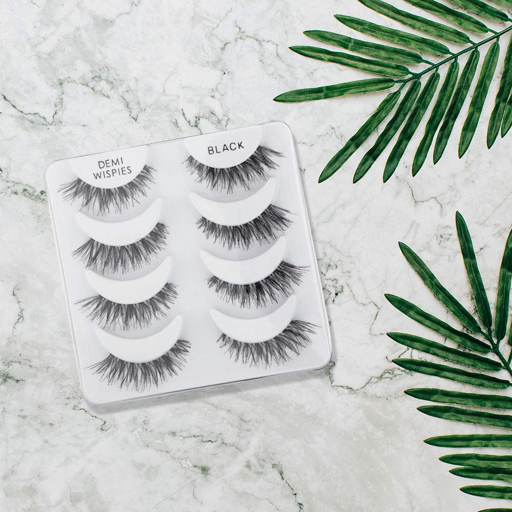 Ardell Demi Wispies application closeup shows feather-light lash band feel