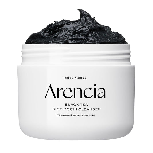 ARENCIA Black Tea Rice Mochi Cleanser bottle close-up showing gentle exfoliation for smoother pores.