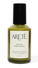 ARETÉ Styling Hair Polish bottle pour: smoothing finish and frizz control.