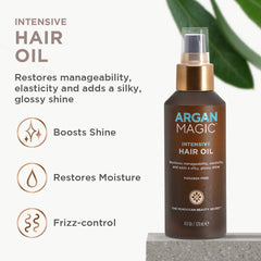 Argan Magic Intensive Hair Oil applied to hair for smooth, hydrated results.