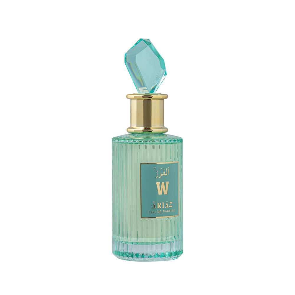 Close-up of warm vanilla and musk base notes on ARIAZ W bottle.