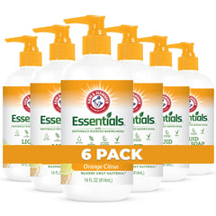 Arm & Hammer orange citrus liquid hand soap bottle on sink with refreshing fragrance.