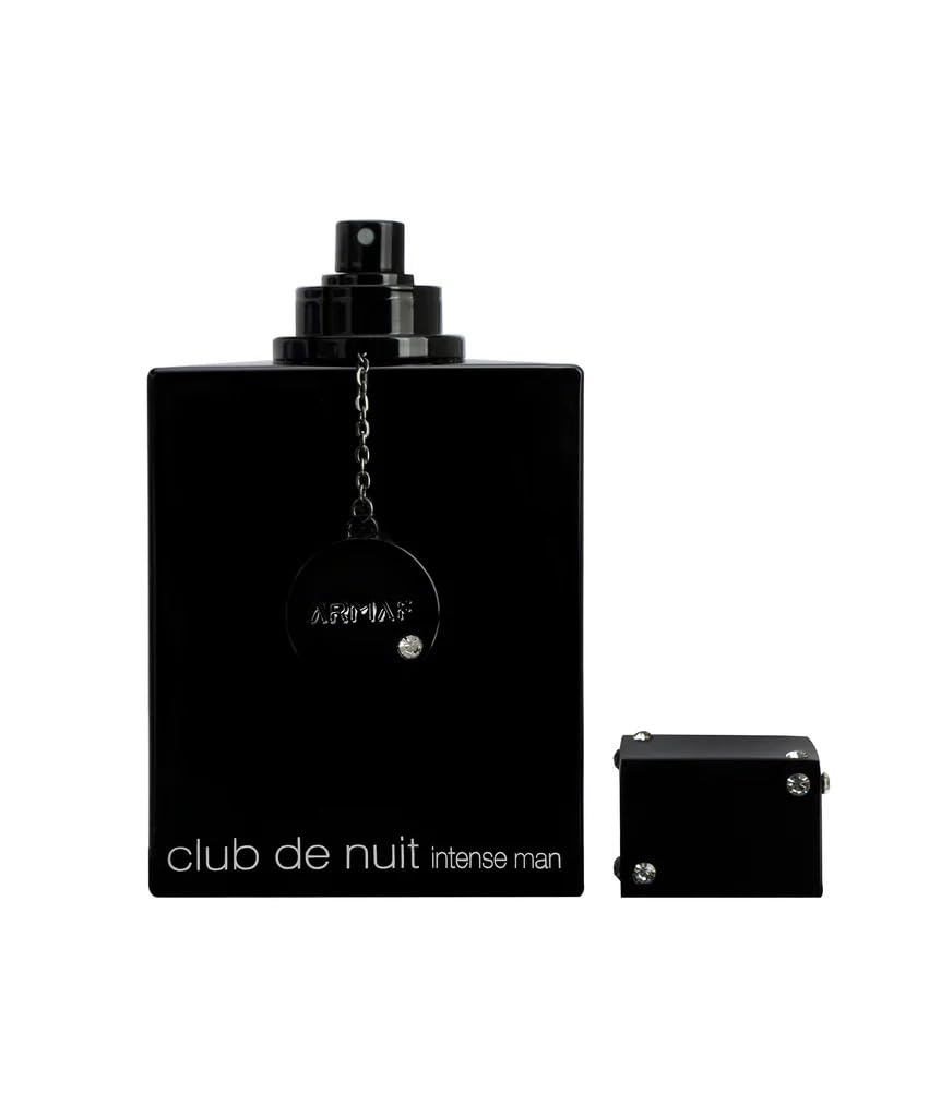 Armaf Club De Nuit Intense spray action, demonstrating immediate scent release and reach.