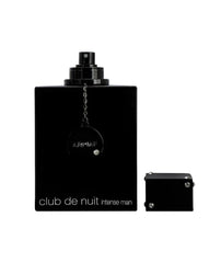 Armaf Club De Nuit Intense spray action, demonstrating immediate scent release and reach.