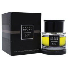 Armaf Niche Black Onyx oud-heart highlights rich wood and resin for sophistication.