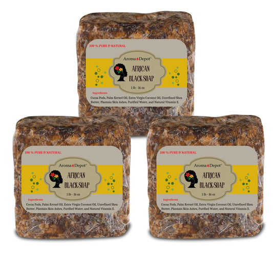 Aroma Depot raw African black soap bar on wood surface for everyday cleansing.