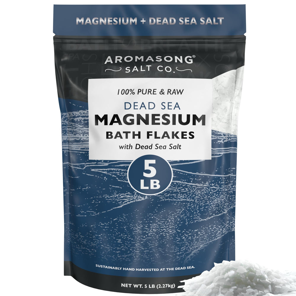 Aromasong raw magnesium flakes bottle pouring into a bath for a soothing soak.