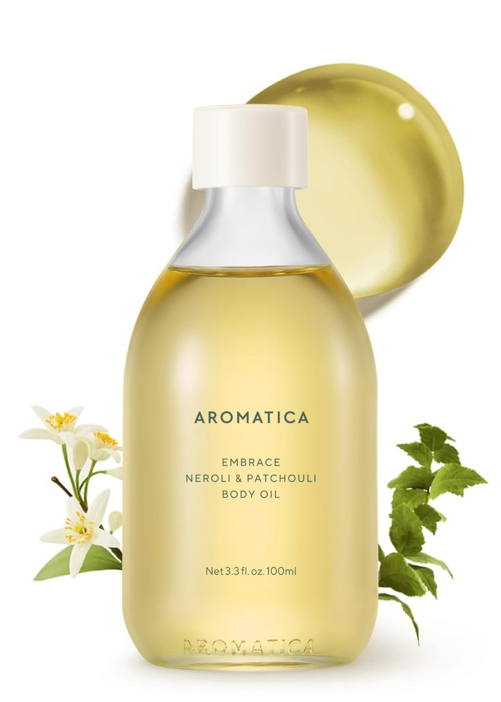 AROMATICA Embrace Body Oil bottle with patchouli-neroli scent for relaxing skin.