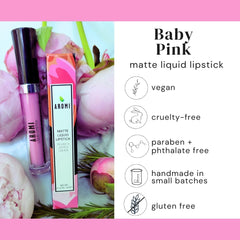 Aromi Baby Pink lipstick tube held in hand for travel-friendly use