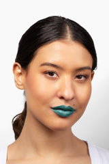 Aromi green metallic swatch reveals teal shine with blue undertones