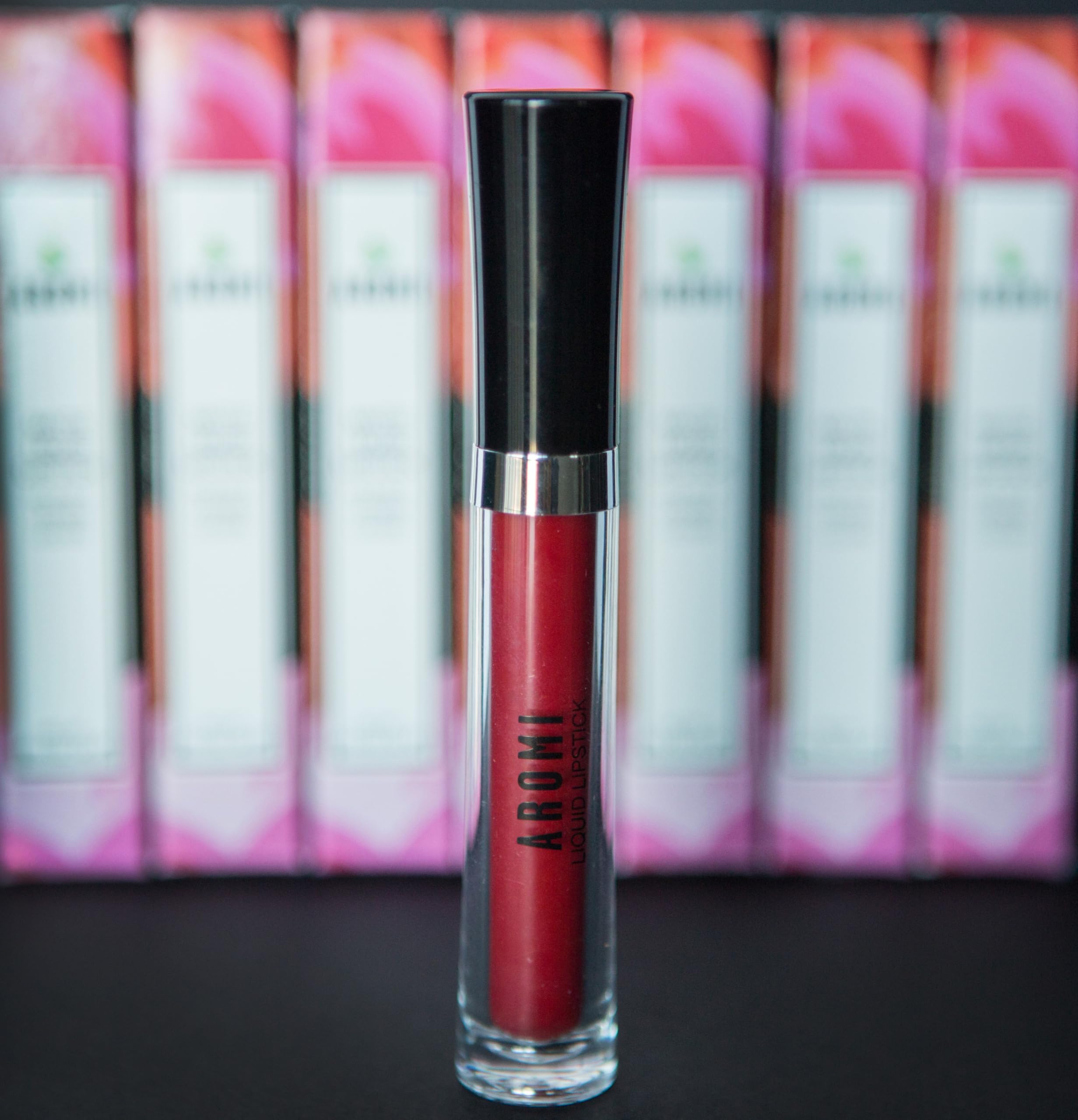 Aromi handcrafted lipstick packaging suggests artisanal quality and care.