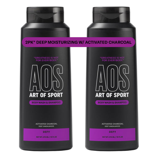 Art of Sport charcoal activated body wash bottle pour showing deep cleansing capability