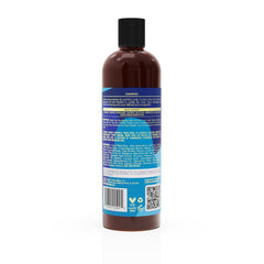 As I Am Dry & Itchy Scalp Care Shampoo label highlighting olive oil and tea tree for scalp.