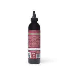 As I Am Onion Shampoo bottle on hair showing easy daily use.