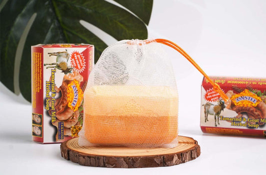 Creamy lather close-up of ASANTEE Tamarind & Goat Milk Soap