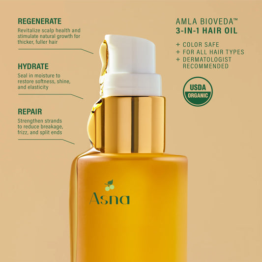 Asna Amla BioVeda in hand applying pre-wash treatment for scalp hydration