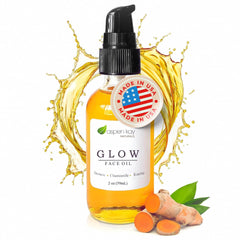 Aspen Kay Naturals Glow turmeric and rosehip oil bottle promotes nourished skin