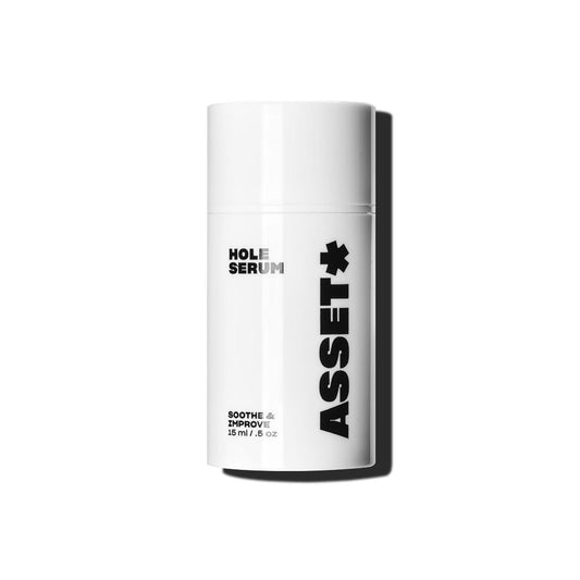 Asset Hole Serum bottle close-up showing fragrance-free derm-approved skincare solution.