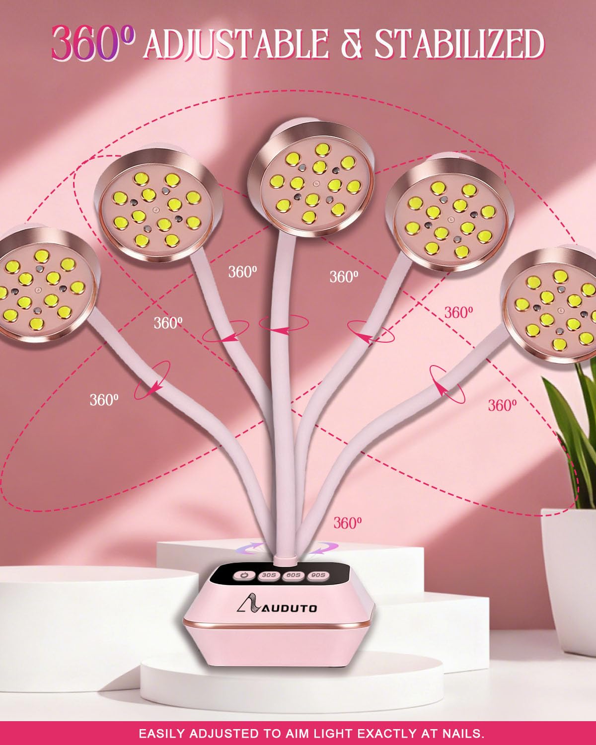 Auduto UV LED nail lamp rose-pink ambient light enhances workspace ambiance.
