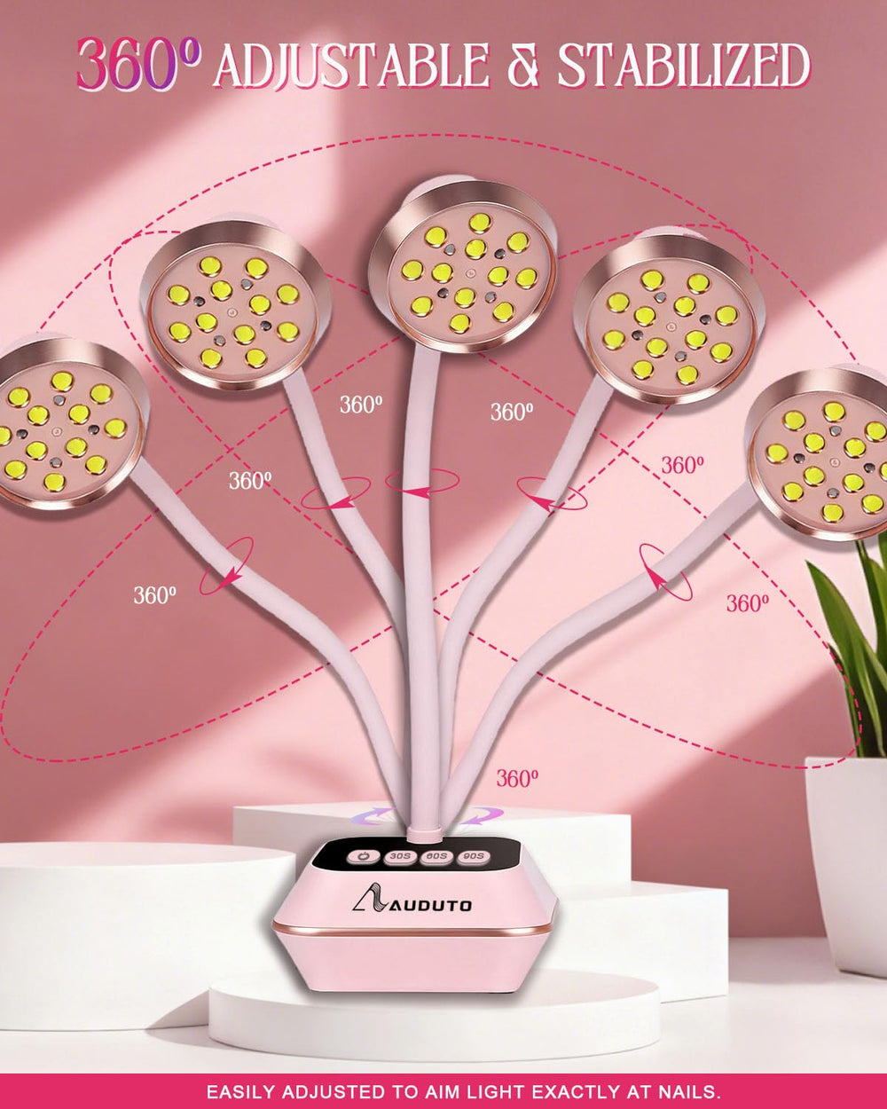 Auduto UV LED nail lamp rose-pink ambient light enhances workspace ambiance.