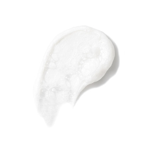 Foaming Cleanser foam on hand demonstrates a rich, gentle lather for cleansing.