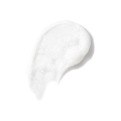 Foaming Cleanser foam on hand demonstrates a rich, gentle lather for cleansing.