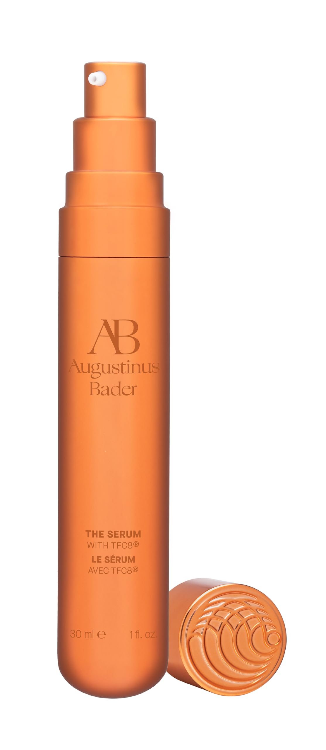 Hands apply The Serum for quick, light absorption.