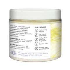 Aura Cacia Tranquil Chamomile Mineral Bath salts close-up highlights spa-like unwind.