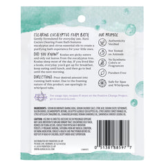 Aura Cacia Foam Bath for Kids bubble bath bottle in hand, paraben-free formula for family baths.