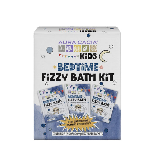 Aura Cacia Kids Bedtime Fizzy Bath packets dissolving in warm water