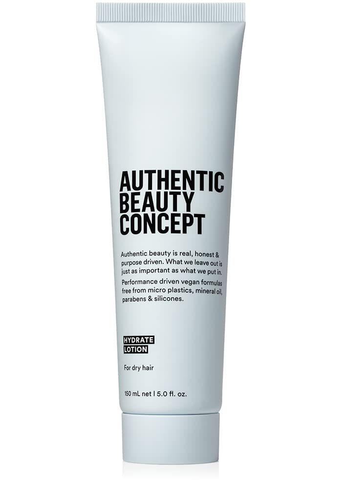 Authentic Beauty Concept Hydrate Lotion bottle pouring for lightweight hydration