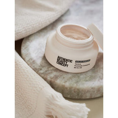 Hair with solid pomade shine, Authentic Beauty Concept shows a polished finish.