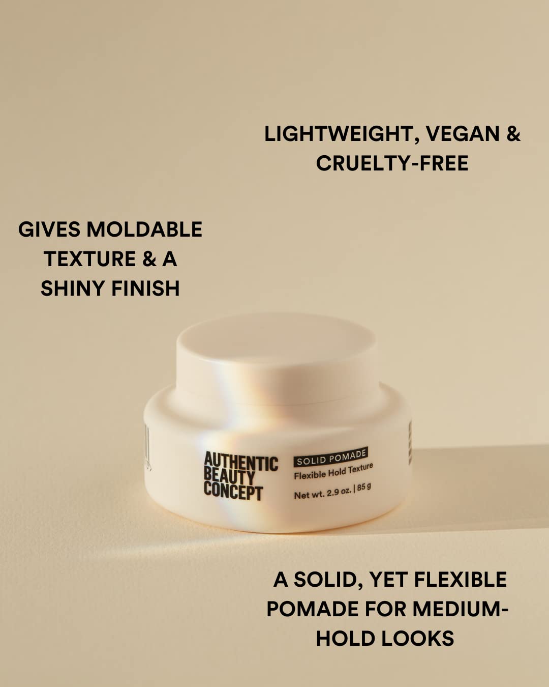 Solid Pomade texture closeup illustrating moldable hold for versatile styling by Authentic Beauty Concept.