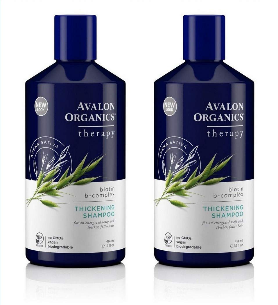 Avalon Organics Biotin B-Complex Thickening Shampoo bottle on a sink for daily fullness