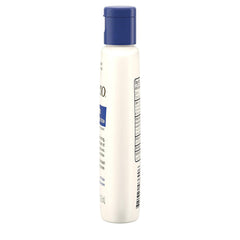 Purse with travel-size Aveeno lotion, ready for on-the-go relief.