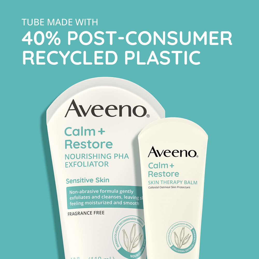 Aveeno label highlights oat oil and PHA for hydrating exfoliation.