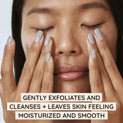 Aveeno Calm + Restore close-up texture showing silky, non-abrasive exfoliation.