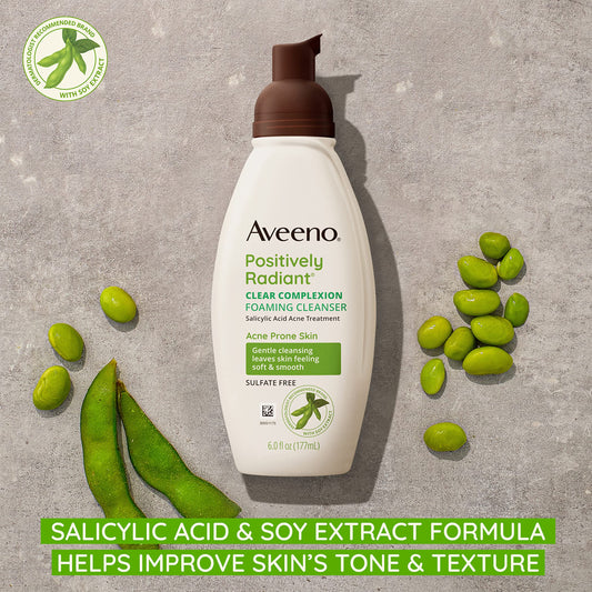 Aveeno Clear Complexion Foaming Cleanser foam close-up showing light, cleansing lather.