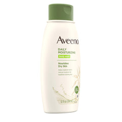 Aveeno Daily Moisturizing Body Wash foam close-up shows creamy lather.