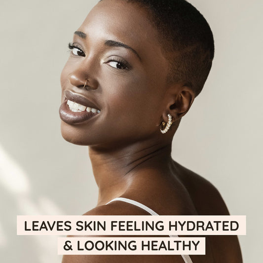 Applying Aveeno fragrance-free cleanser on the face for a gentle cleanse.