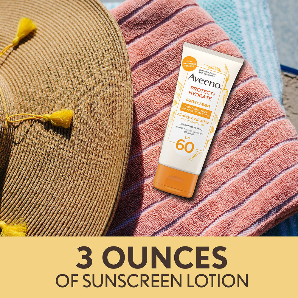 Applying Aveeno Protect + Hydrate SPF 60 on arm outdoors