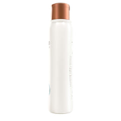 Aveeno bottle beside natural ingredients emphasized in clean formula.