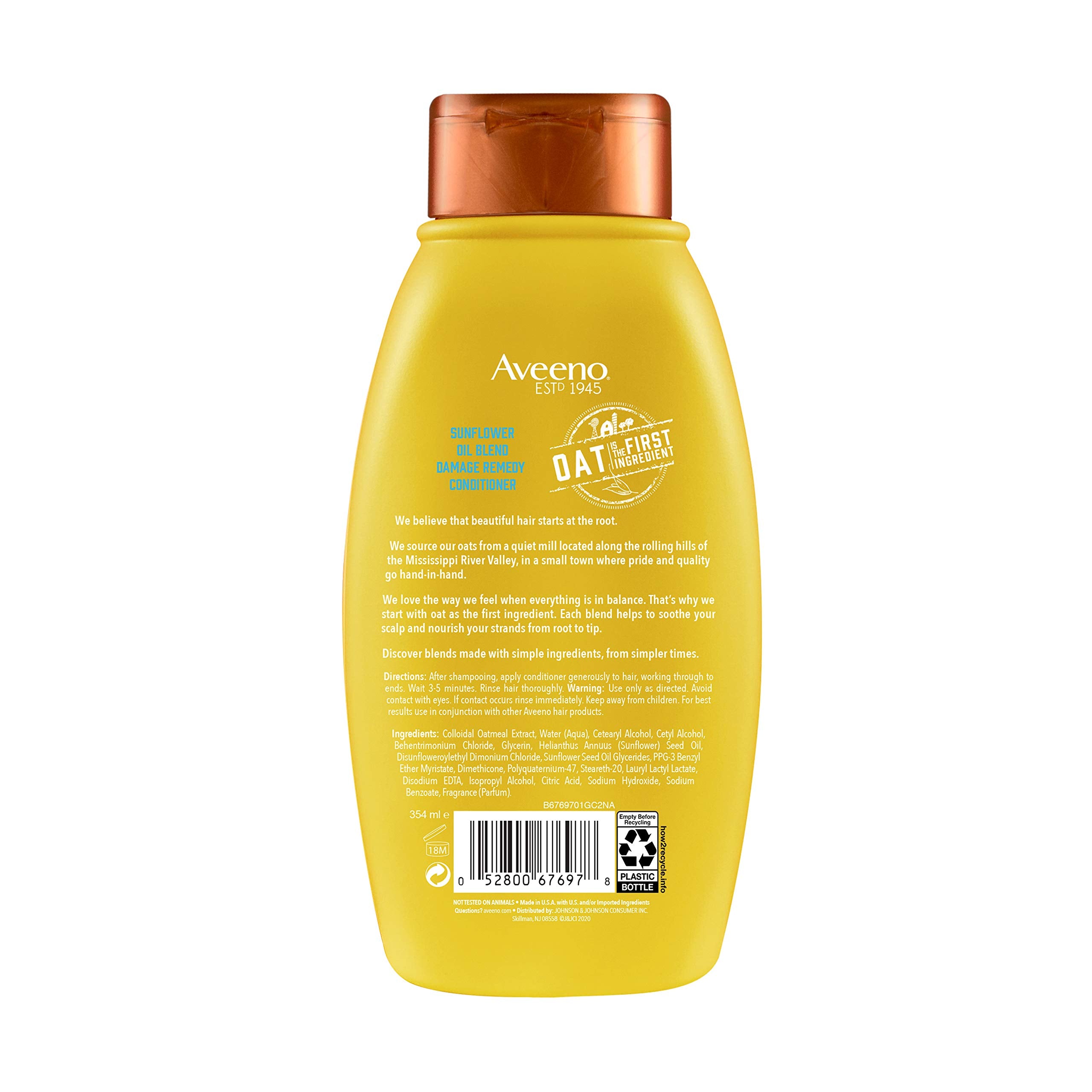 Aveeno conditioner applied to hair for smooth manageability.