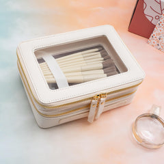 Aveniee two-layer travel bag showing ample space for cosmetics and toiletries.