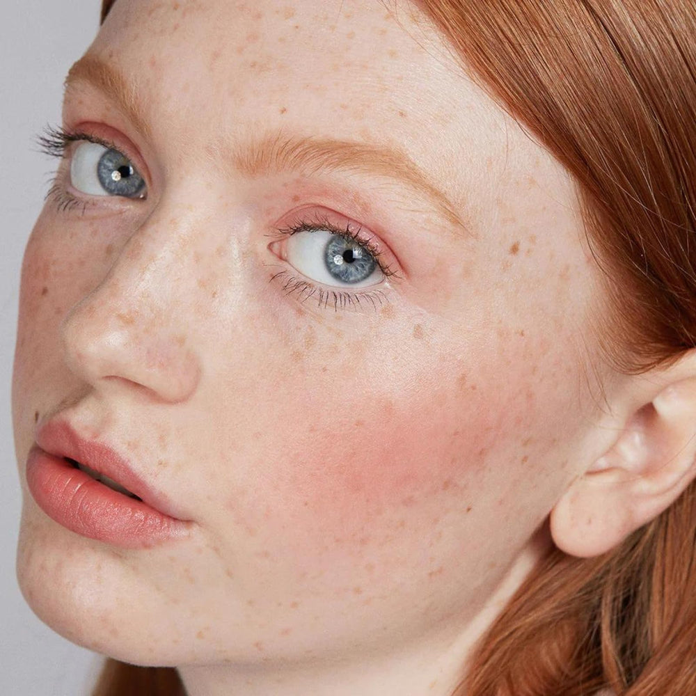 Axiology Balmie Trio texture closeup shows creamy glide and semi-matte finish