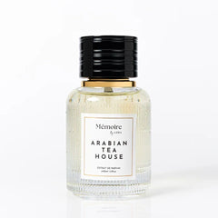 Azha Arabian Tea House swirl in glass, reveals warm vanilla and woody base.