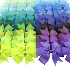 Babymatch pinwheel bow wear-on-ponytail offers versatile styling options.