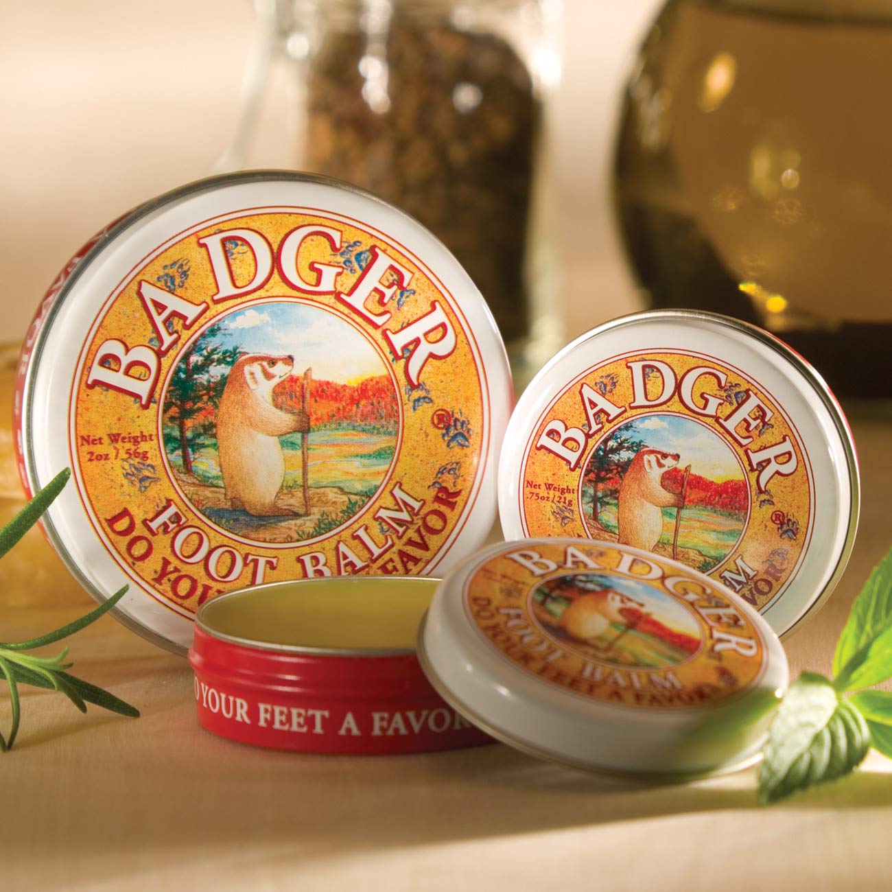 Badger Foot Balm application close-up showing pea-sized amount to heel