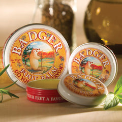 Badger Foot Balm application close-up showing pea-sized amount to heel